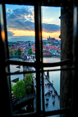 Fototapeta premium A view of Prague Castle and the Charles Bridge across the Vltava River in Prague, Czech Republic.