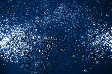 Blue sparkling abstract background. Festive concept. Color 2020 concept.