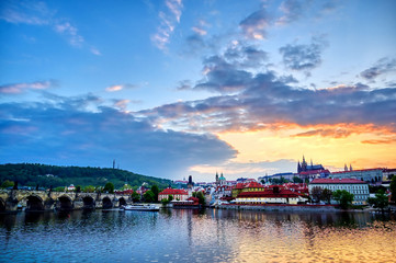 A view of Prague Castle and the Charles Bridge across the Vltava River in Prague, Czech Republic.
