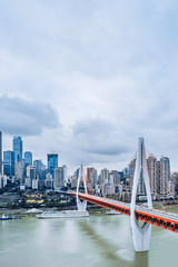 Obraz premium High rise buildings and dongshuimen bridge in Chongqing, China