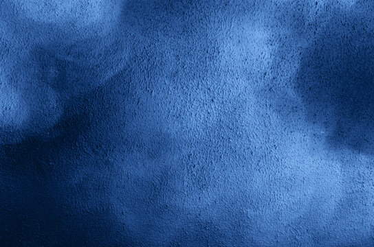 Colorful textured abstract background. Copy space. Trendy classic blue background. Monochrome concept color