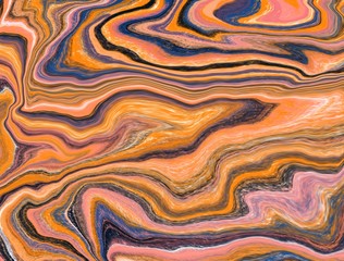 Fashionable colorful background is made in the technique of fluid art with blue accents. The marble...