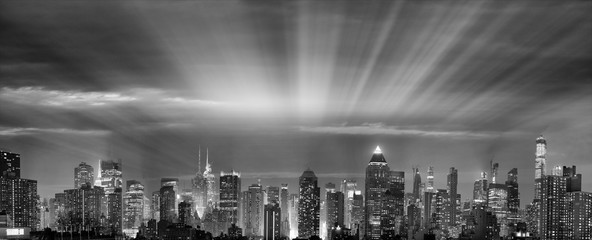 Panoramic night skyline of Midtown Manhattan at dusk, New York City