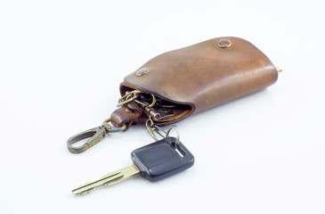 Old car keys on a white background
