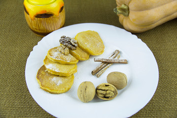 Pancakes with cinnamon, pumpkin and walnuts