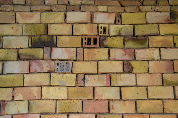 Fototapeta premium Old brick wall texture with scratches and cracks, vintage grunge background
