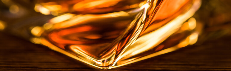 Close up view of brandy in glass, panoramic shot