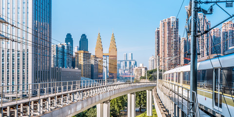 Light rail platform and high-rise buildings in Chongqing, China © Govan