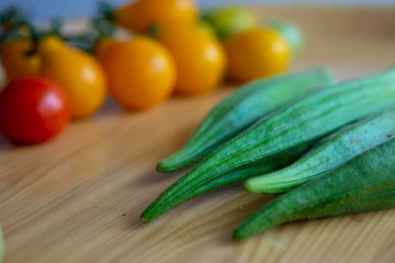 fresh green zucchini and vegetable on wooden table
