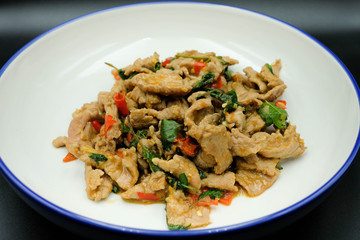 Stir Beef with basil leaves and red chilli in Thai style food using as food and ingredient for asia concept.