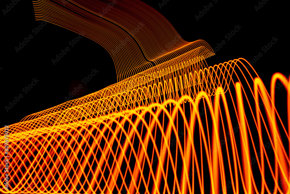 Wall mural Bright neon line designed background, shot with long exposure. Modern background in lines style. Abstract, creative effect, texture with lighting, art of colors combination. Artistic choice of shapes.