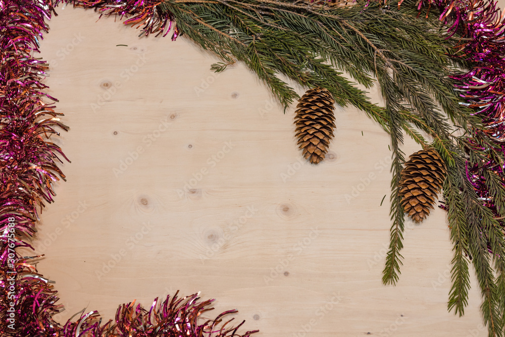 Wall mural christmas background. christmas branch of spruce on a wooden background.