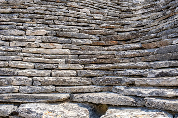 Stone roof trullo, fragment. Background. Alberobello, Italy.