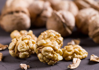 Still life with nuts on natural wood.