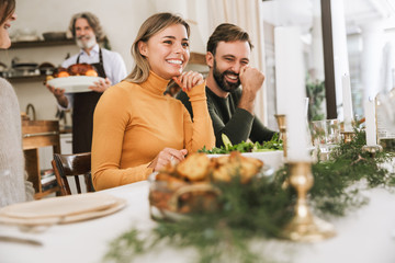 Happy big family celebrating Christmas together at home