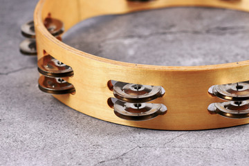Close up pairs of small metal jingles called 'Zills' of Tambourine percussion music instrument