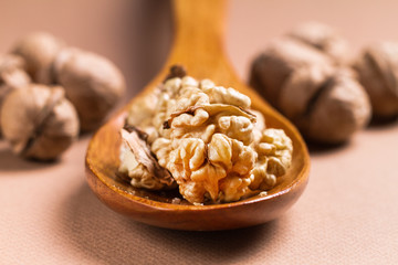 Still life with nuts on natural wood.