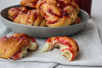 Yeast buns with raspberry jam
