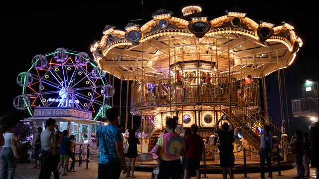 Time lapse/Carousel in amusement park