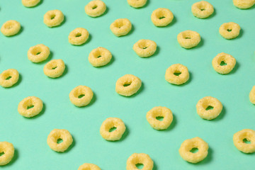 Flakes on a green background. Pattern.