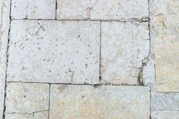 the wall is faced with stone tiles