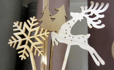 wooden Christmas patterns in the shape of deer, star and Christmas trees