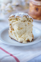 Cutted easter cake and painted eggs