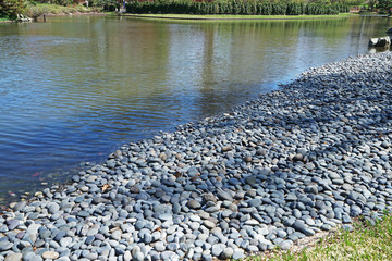 Natural rocky pond and garden arranged in Japanese Zen style