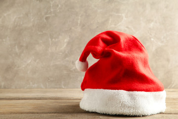 Santa Claus red hat on grey concrete background