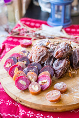 Dried persimmons and churchkhela - Georgian traditional winter holidays sweet dessert.