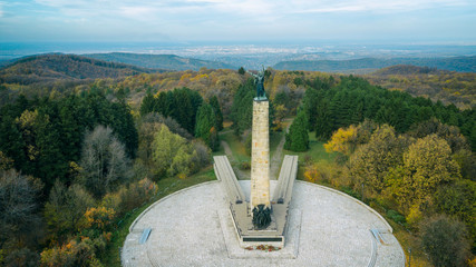 Aerial view of monument of SFRJ architecture in woods. Fruska Gora mountain near Novi Sad. © MexChriss