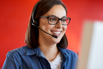Headshot of a confident businesswoman sitting at her desk