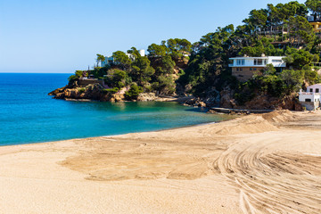 Fototapeta na wymiar View of the path on the right side of the Sa Riera cove that goes to the S'Antiga cove and the Reina tip, Begur, Costa Brava, Catalonia, Spain