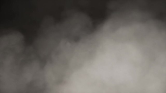 white steam / smoke / ink texture animation vfx effects on black background.  compositing into shots particle effect (4K UHD seamless looping, computer digitally generated animation.)