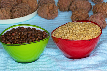 Pine nuts in beautiful cups peeled for salad