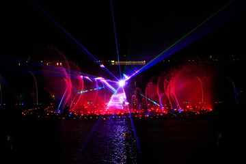 Fototapeta na wymiar Music fountain water curtain laser