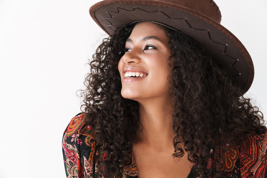 Beautiful cheerful young woman wearing cowboy hat
