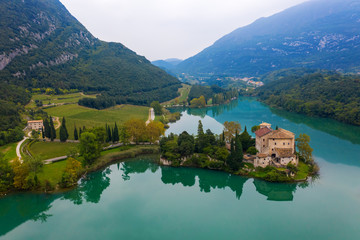 Calavino, Italy. Toblino castle on a beautiful lake.
