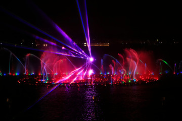 Fototapeta na wymiar Music fountain water curtain laser