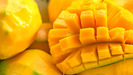 close up Mango fruit and mango cubes macro photography texture background