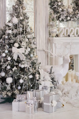 Room decorated for Christmas or new year. The interior of the room with a Christmas tree