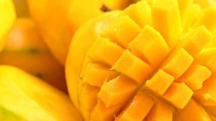 close up Mango fruit and mango cubes macro photography texture background