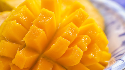 close up Mango fruit and mango cubes macro photography texture background