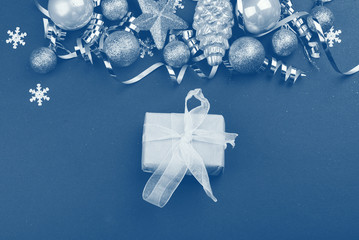 Beautiful festive red background with sparkles and Christmas golden toys. Holiday blue Content.