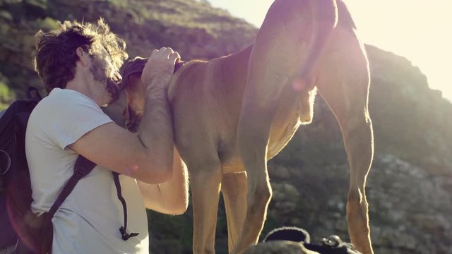 Close relationship between dog and owner, loving affectionate hug man's best friend