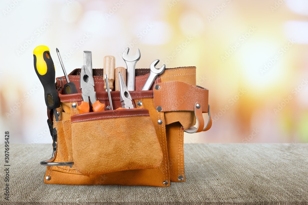 Wall mural set of tools in tool box isolated at white background