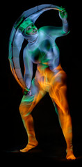 Artistic portrait of a model in the image of the month, painted with colorful light