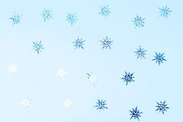 Festive and shiny background. Little stars on a light blue background.