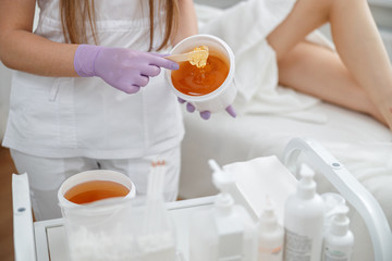 young girl in beauty salon, laser epilation and beauty