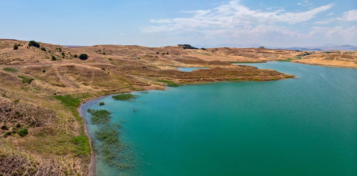 Aerial view of rural and agricultural areas south of Lokman in the province of Adiyaman, Turkey. Inlets on the Euphrates river formed by the Ataturk dam. Desert lands